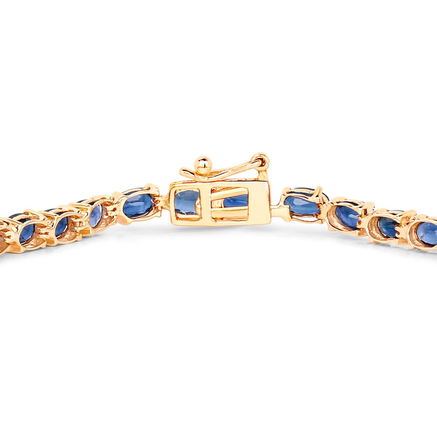 Taille ovale Bracelet de tennis en saphir bleu 8,8 carats or jaune 10K en vente