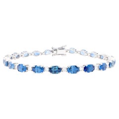Bracelet tennis à maillons en or blanc 18 carats avec saphir bleu et diamants 13 carats