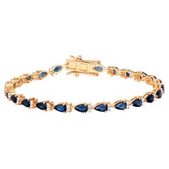 Bracelet de tennis saphir bleu Diamants 5,3 carats Or jaune 14K