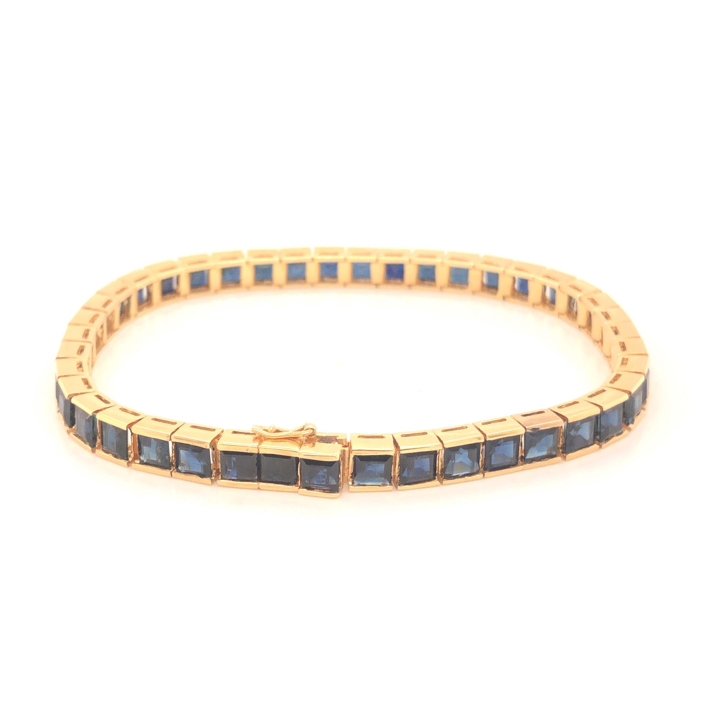 Modern Blue Sapphire Tennis Bracelet in 14k Yellow Gold For Sale