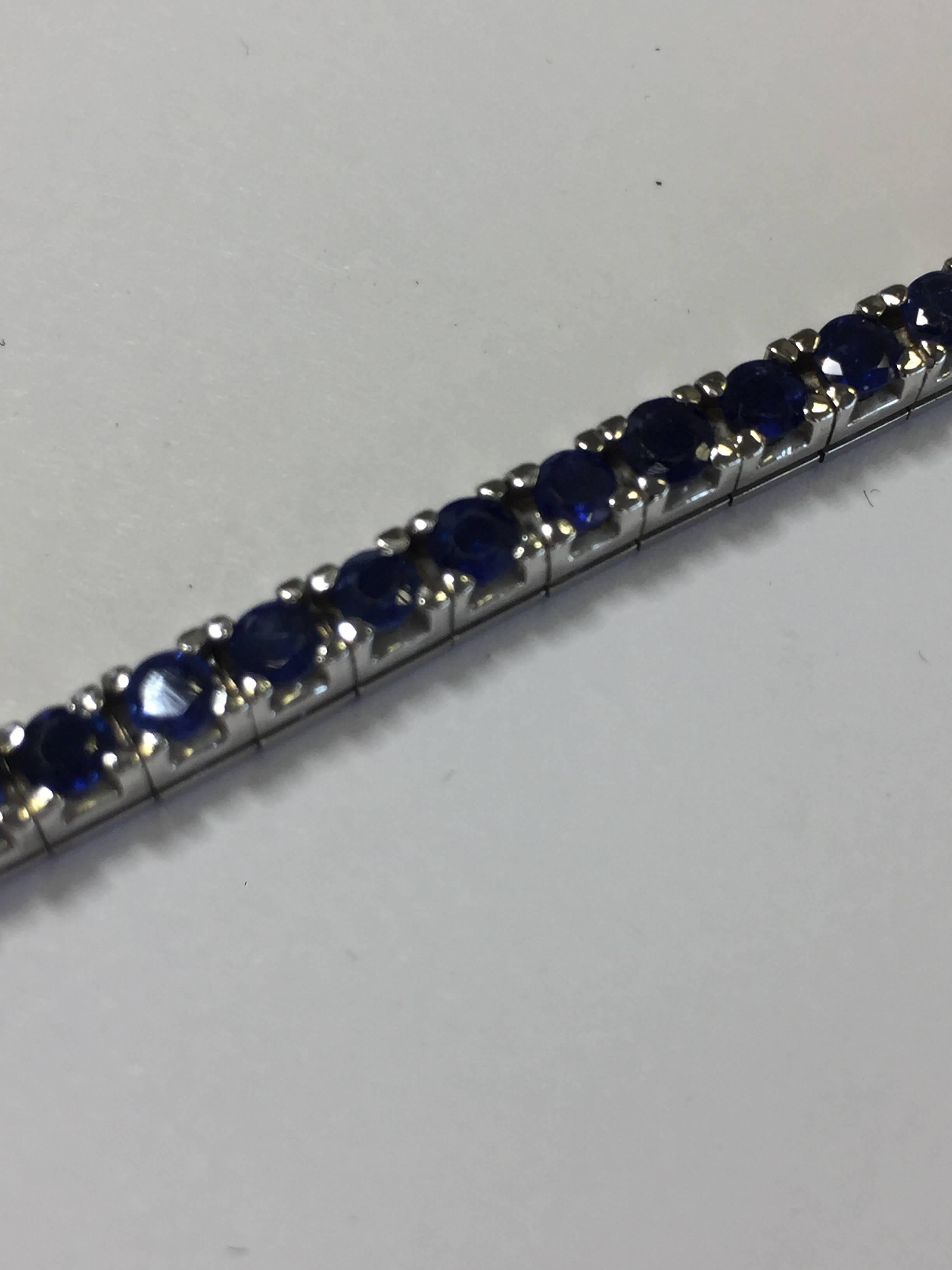 10 carats of beautiful deep blue sapphires in this 18k white gold 7