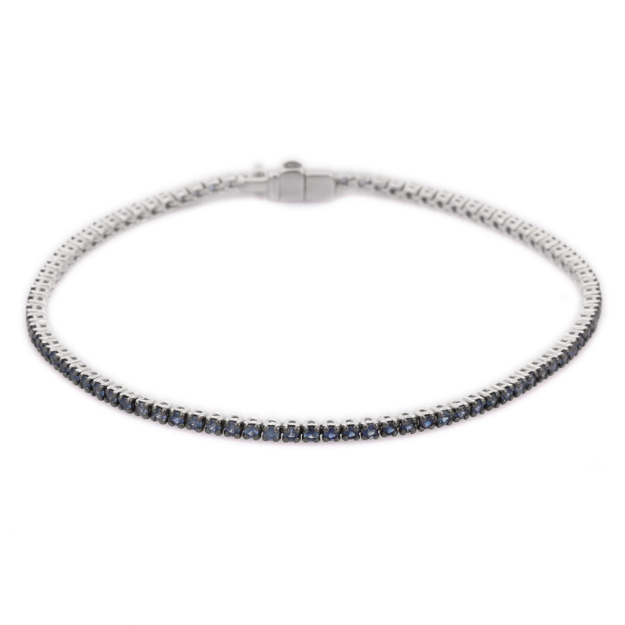 Modern Blue Sapphire Tennis Bracelet in 18K White Gold For Sale