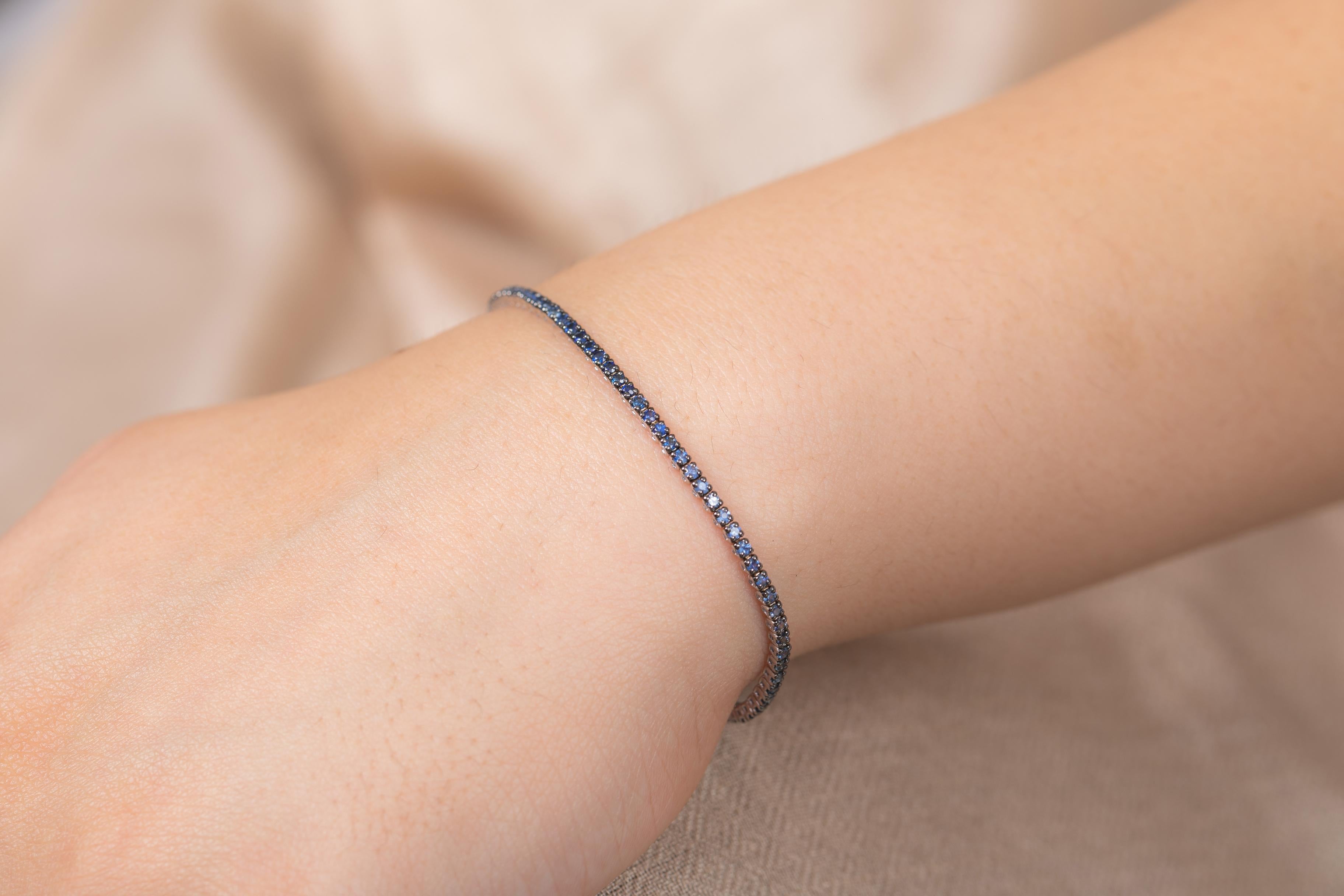 Round Cut Blue Sapphire Tennis Bracelet in 18K White Gold
