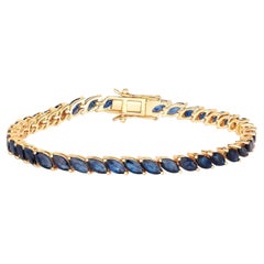 Bracciale tennis con zaffiro blu taglio marquise 12,7 carati in oro giallo 10 carati