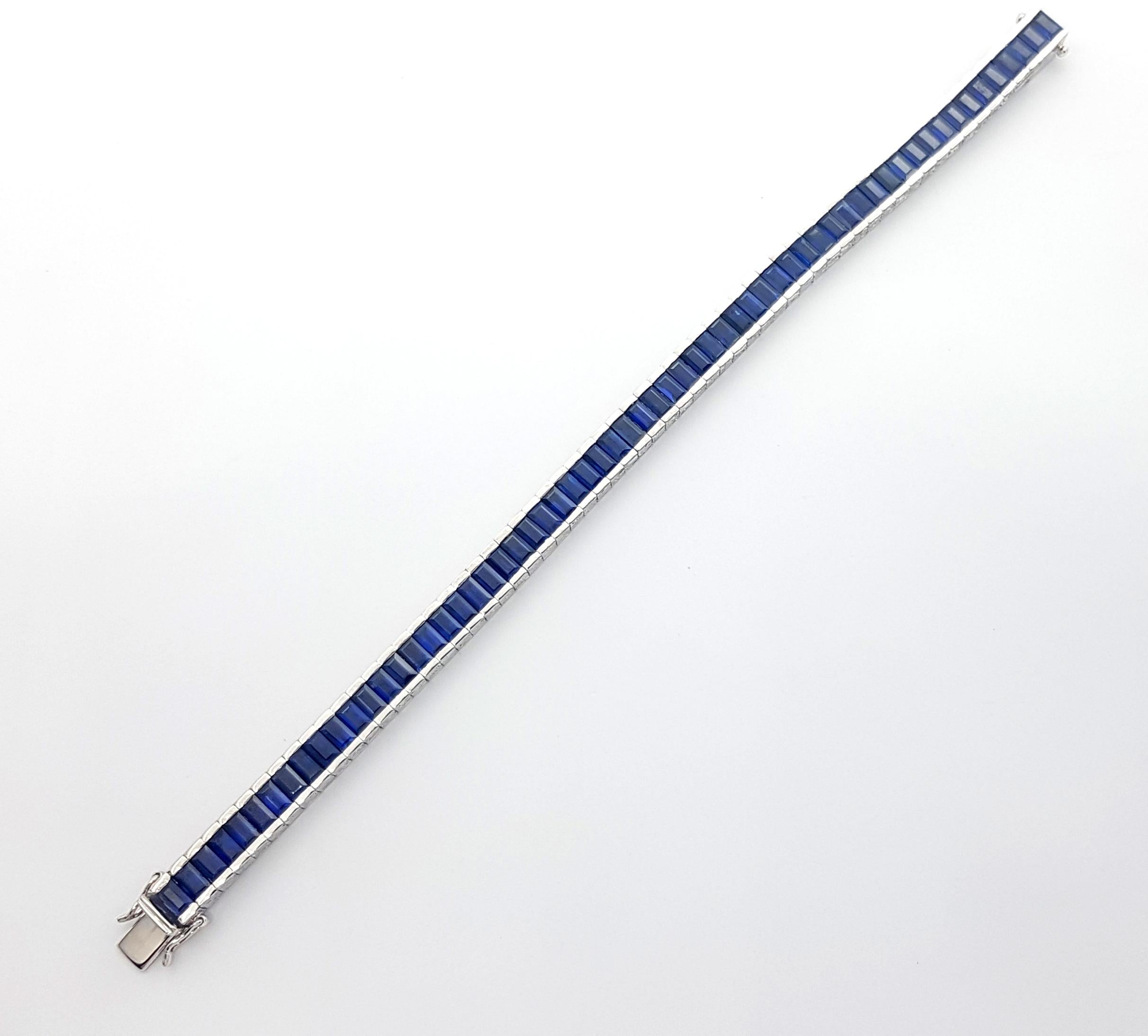 Blue Sapphire 22.39 carats Bracelet set in Platinum 950 Settings

Width:  0.6 cm 
Length: 18.0 cm
Total Weight: 61.58 grams

