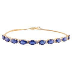 Bracciale tennis con zaffiro blu e diamanti per matrimonio in oro giallo 18 carati