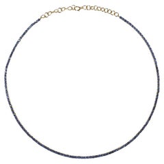 Collier tennis en saphir bleu, saphirs ronds naturels, or jaune 14 carats