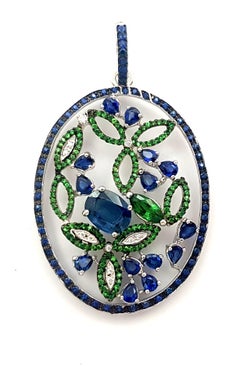 Blue Sapphire, Tsavorite and Diamond Pendant set in 18K White Gold Settings