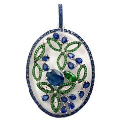 Blue Sapphire, Tsavorite and Diamond Pendant set in 18K White Gold Settings