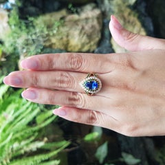 Blue Sapphire, Tsavorite and Diamond Ring set in 18K Rose Gold Settings