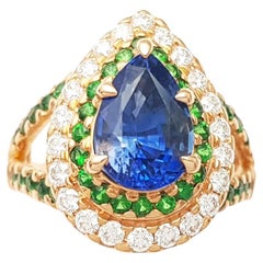 Blue Sapphire, Tsavorite and Diamond Ring set in 18K Rose Gold Settings