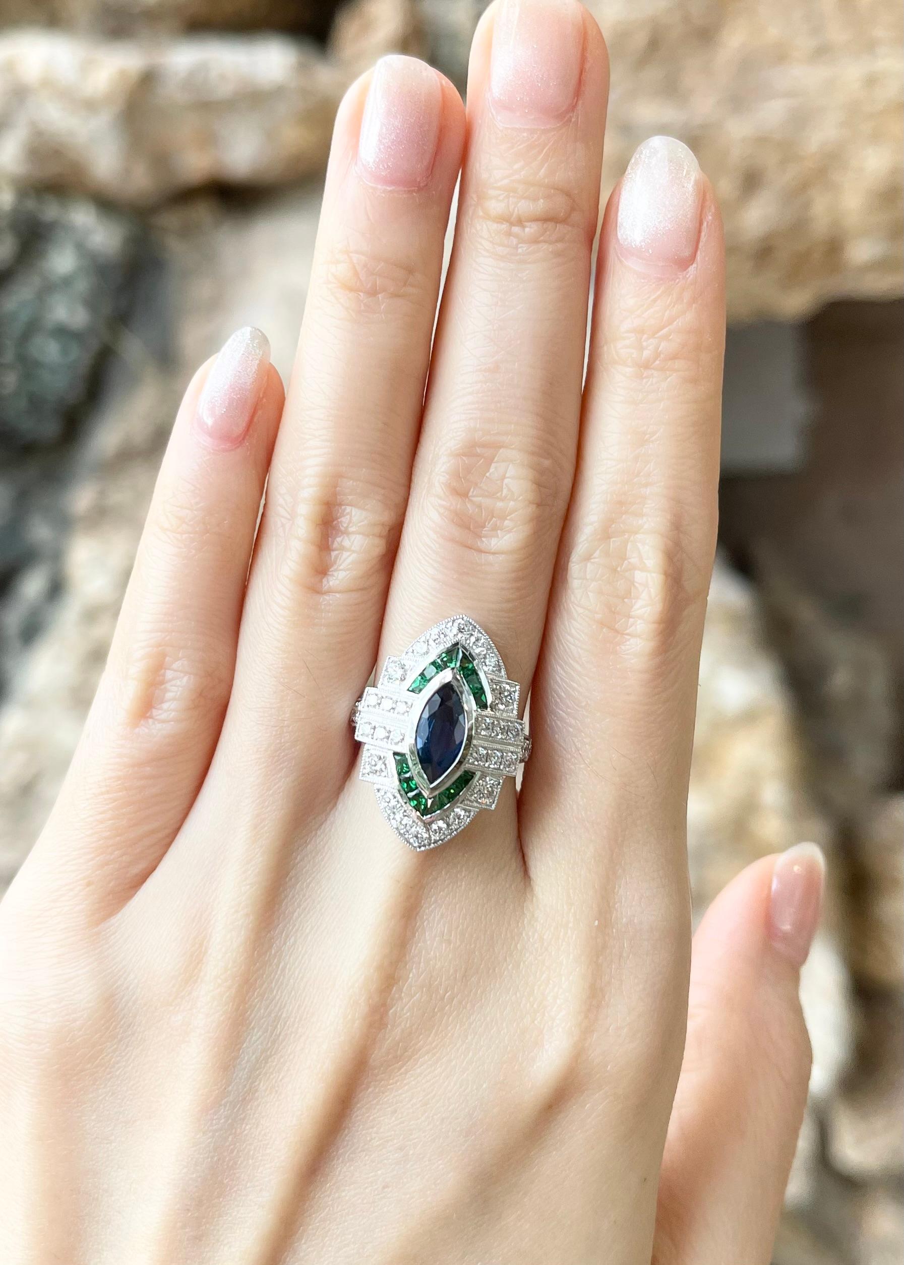 Blue Sapphire 1.13 carats, Tsavorite 0.95 carat and Diamond 0.90 carat Ring set in 18K White Gold Settings

Width:  1.6 cm 
Length: 2.4 cm
Ring Size: 53
Total Weight: 6.66 grams

