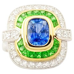 Bague en or blanc 18 carats sertie de saphirs bleus, de tsavorites et de diamants