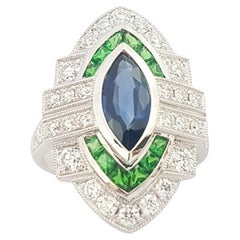 Ring aus 18 Karat Weißgold mit blauem Saphir, Tsavorit und Diamant in Fassungen