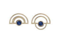 Boucles d'oreilles en or 18 carats avec saphirs bleus en torsade et reflets