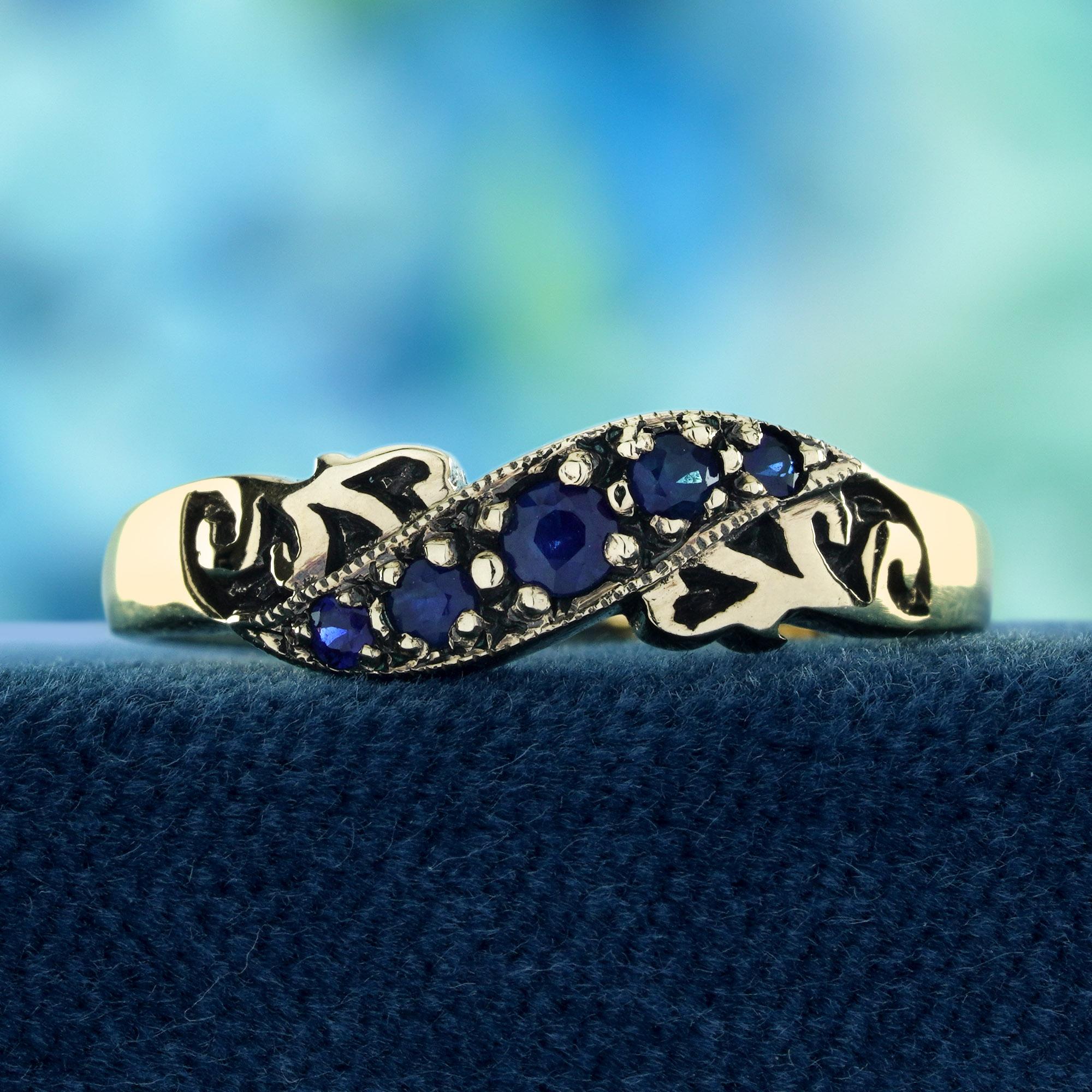 Timeless Elegance with a Touch of GlamourEnhance your jewelry collection with this stunning Natural Blue Sapphire Vintage Style Curve Ring in Solid 9K Yellow Gold. This exquisite piece combines classic charm with modern sophistication.The blue