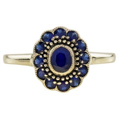 Blue Sapphire Vintage Style Floral Ring in 9K Yellow Gold Blue Sapphire Vintage Style Floral Ring in 9K Yellow Gold