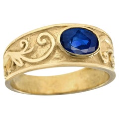 Bague vintage en saphir bleu  en or jaune 9K massif