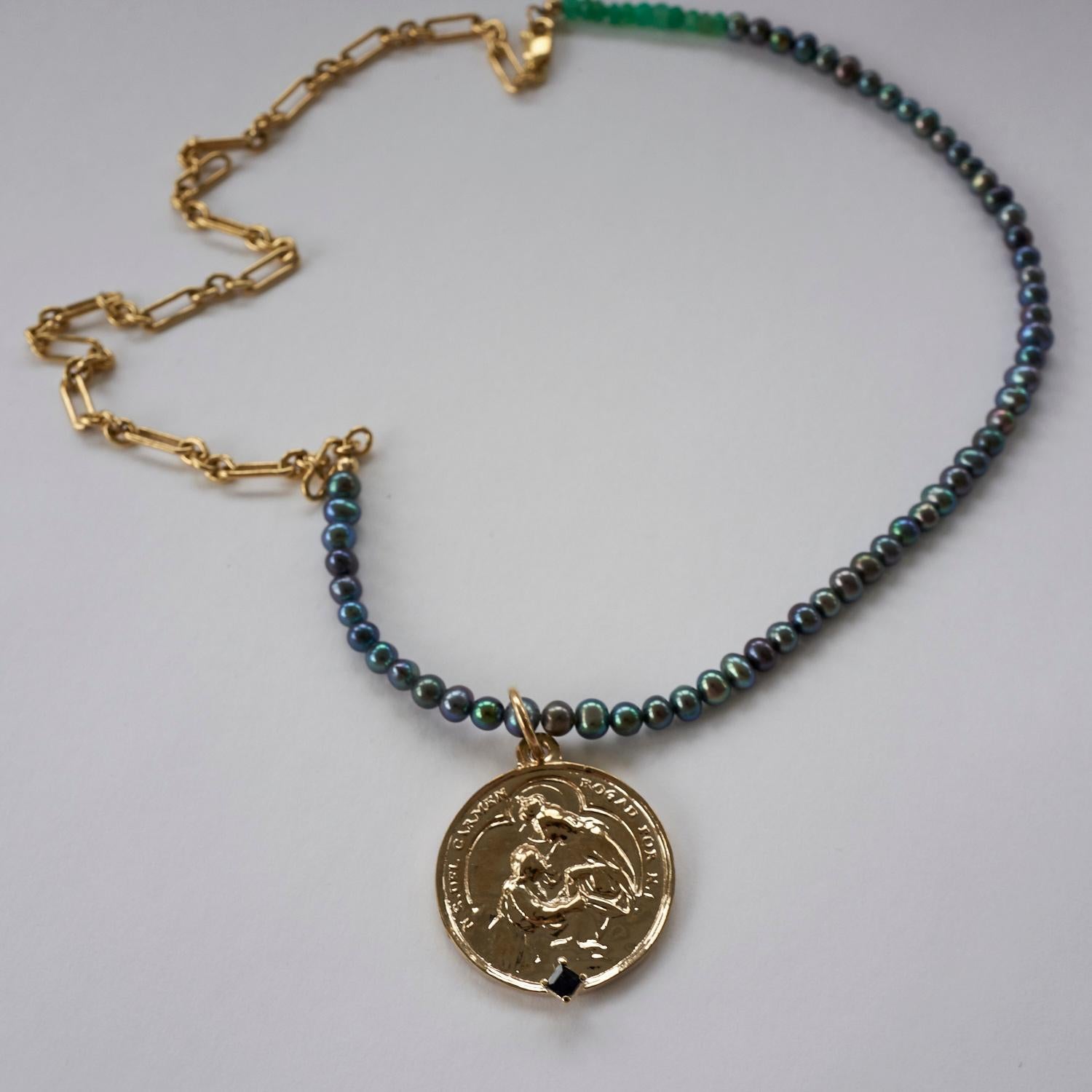 Sapphire Virgin Mary Black Pearl Medal Coin Pendant Chain Necklace J Dauphin

Exclusive piece with Virgin Mary Medal Round Coin pendant in Bronze with a square Emerald  set in Gold prong and a gold filled Chain. Necklace is 22