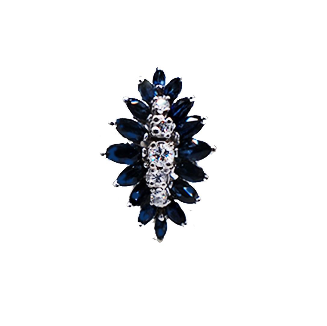Sapphire Cocktail with Diamonds is a showpiece statement of a ring. Set in 14 Karat white gold the ring extends nicely on the ring.

 Vibrant colored blue sapphires (16) have a total weight of 1.50 carat and are marquise shaped.
Center of ring are