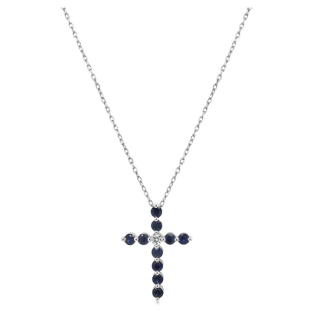 Collana con ciondolo a croce in oro bianco 18 carati con zaffiro blu e diamanti bianchi