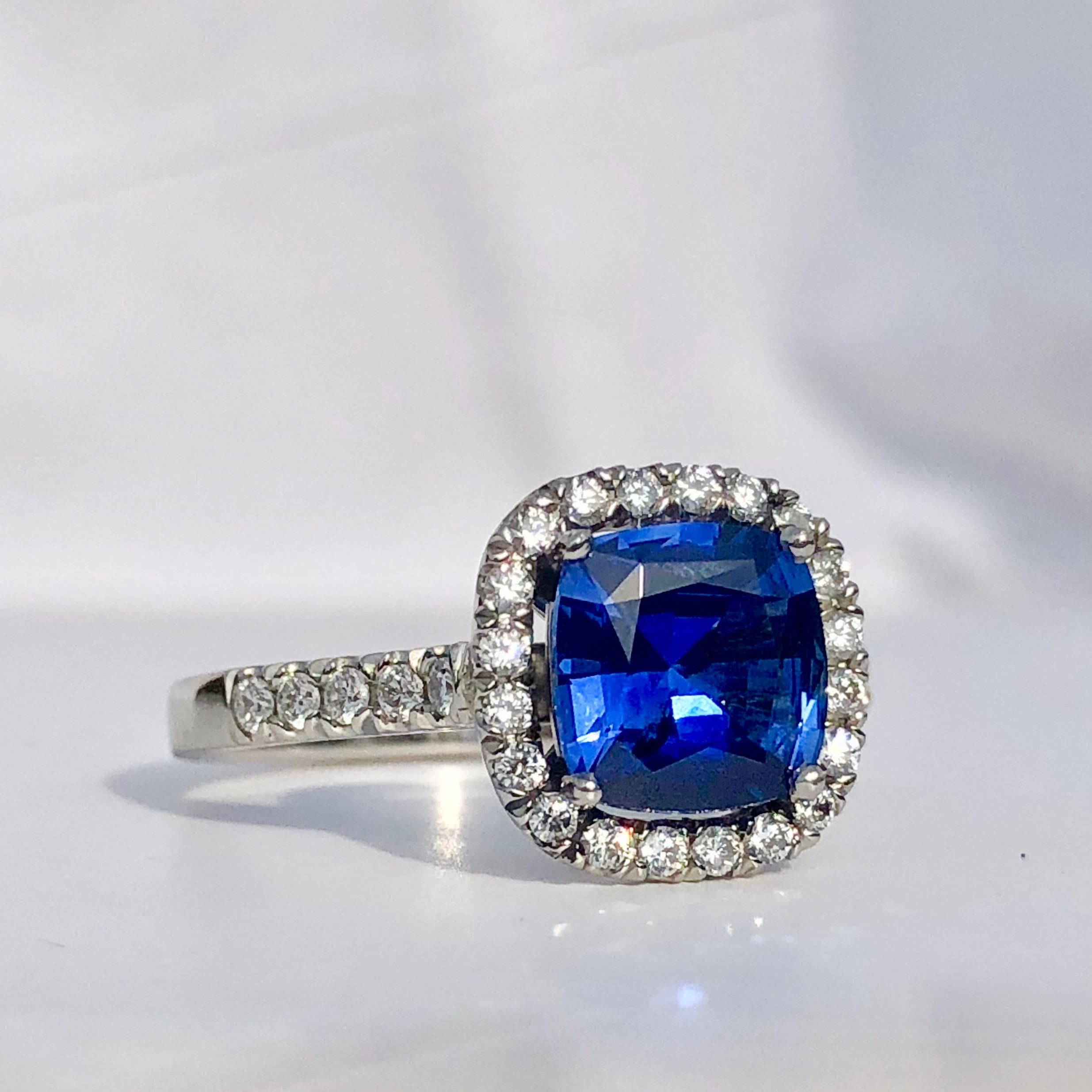 
This Rich Blue Sapphire Is Surrounded by a Halo of Round Brilliant Cut Diamonds Further Enhanced with Diamond Set Shoulders

Made for The Duchess of Diamonds Collection 

A Video of This Piece is Available Upon Request

The Duchess Of Diamonds