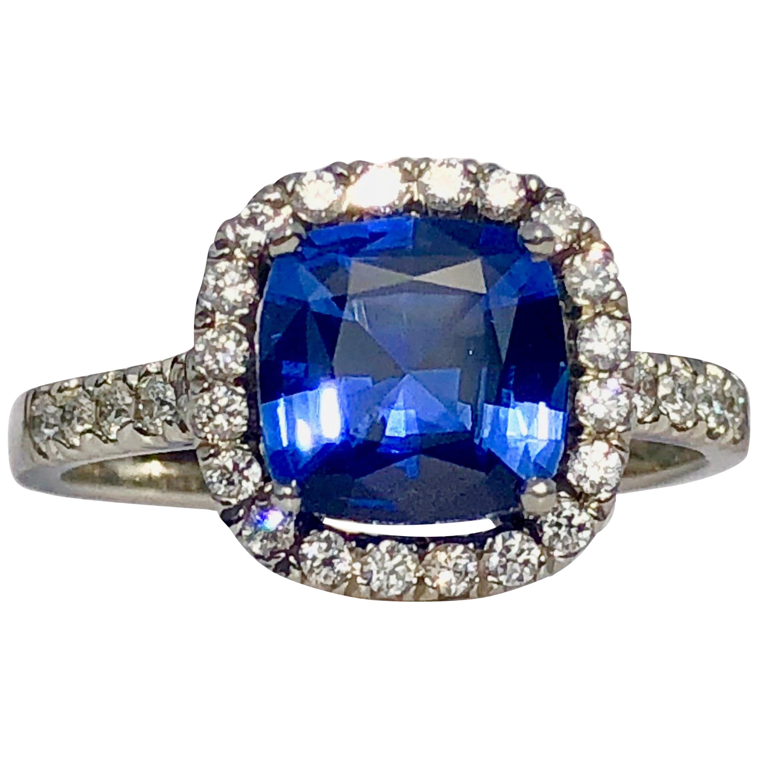 Blue Sapphire White Diamond Platinum Engagement Round Brilliant Cut Halo Ring