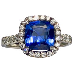 Blue Sapphire White Diamond Platinum Engagement Round Brilliant Cut Halo Ring