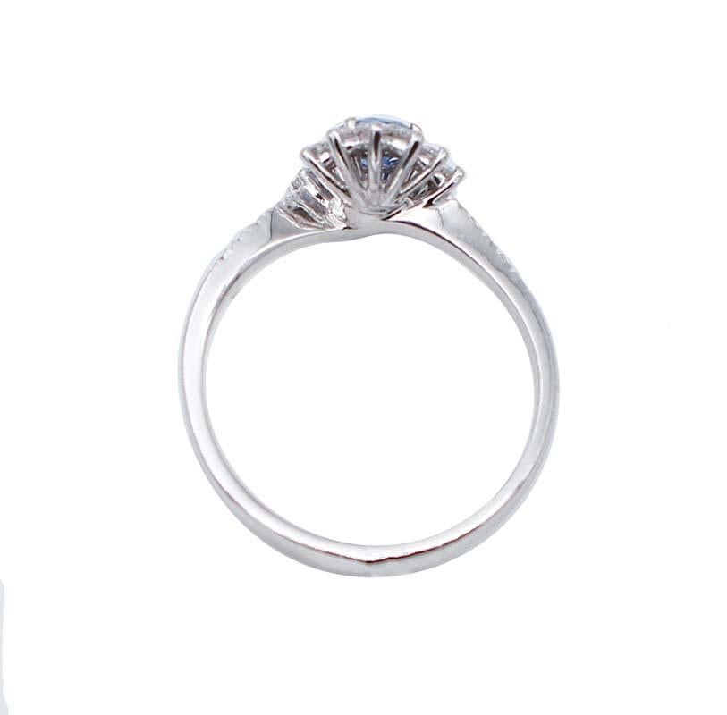Modern Blue Sapphire, White Diamonds, 18 Karat White Gold Engagement Ring