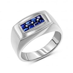Anello esclusivo in oro bianco con zaffiro blu per lei