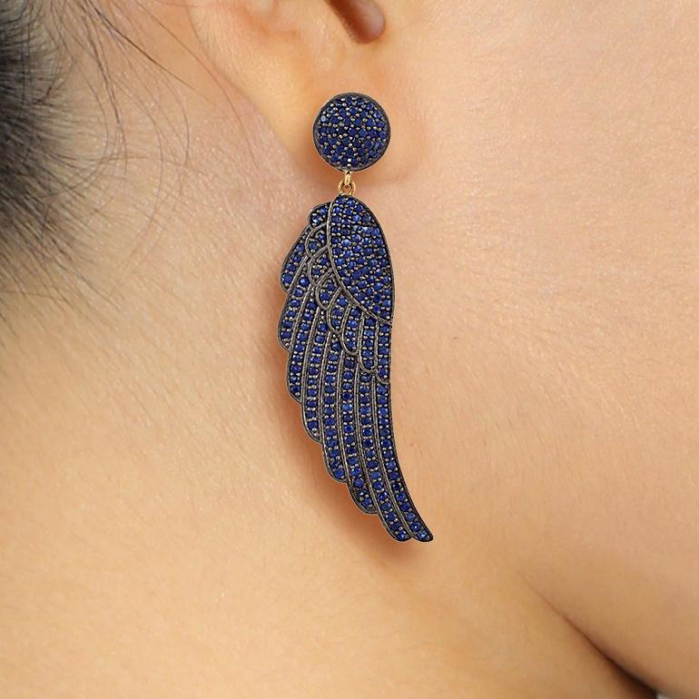 Contemporary Blue Sapphire Wings Chandelier Earrings 6.9 Carats For Sale
