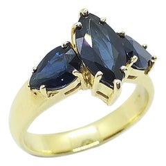 Bague en or 18 carats sertie d'un saphir bleu et d'un saphir bleu