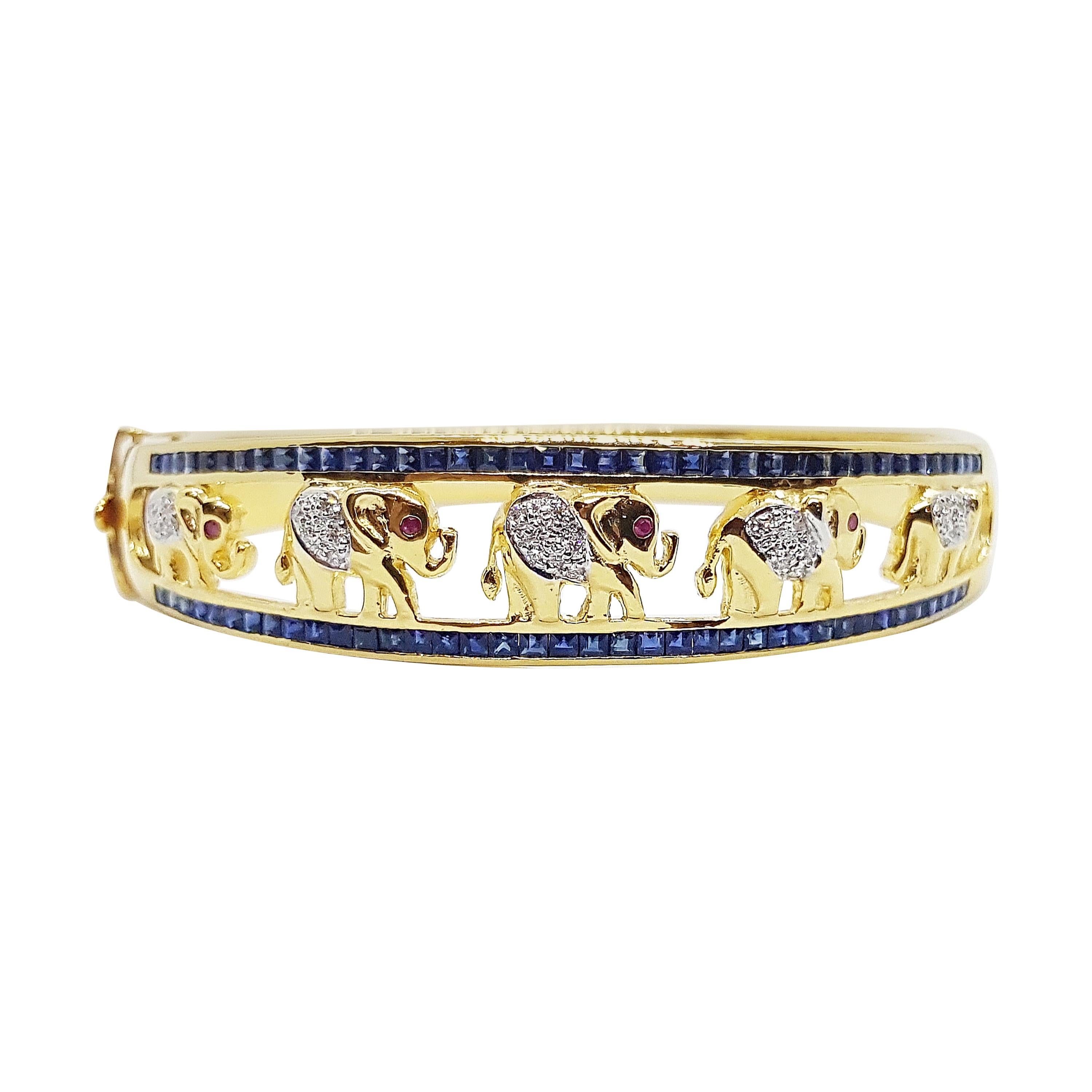 Blue Sapphire with Cabochon Ruby and Diamond Bangle Elephant in 18K Gold For Sale