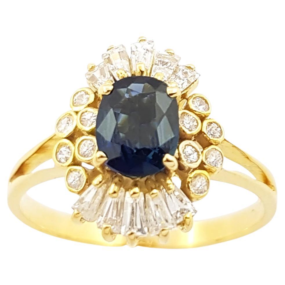 Ring aus 14 Karat Gold mit blauem Saphir und kubischem Zirkon in Ringfassung im Angebot