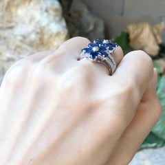 Blue Sapphire with Cubic Zirconia Ring set in Silver Settings