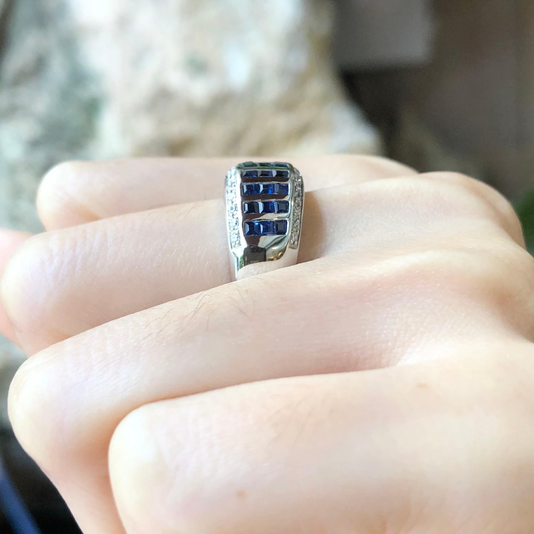 Contemporary Blue Sapphire with Cubic Zirconia Ring set in Silver Settings For Sale