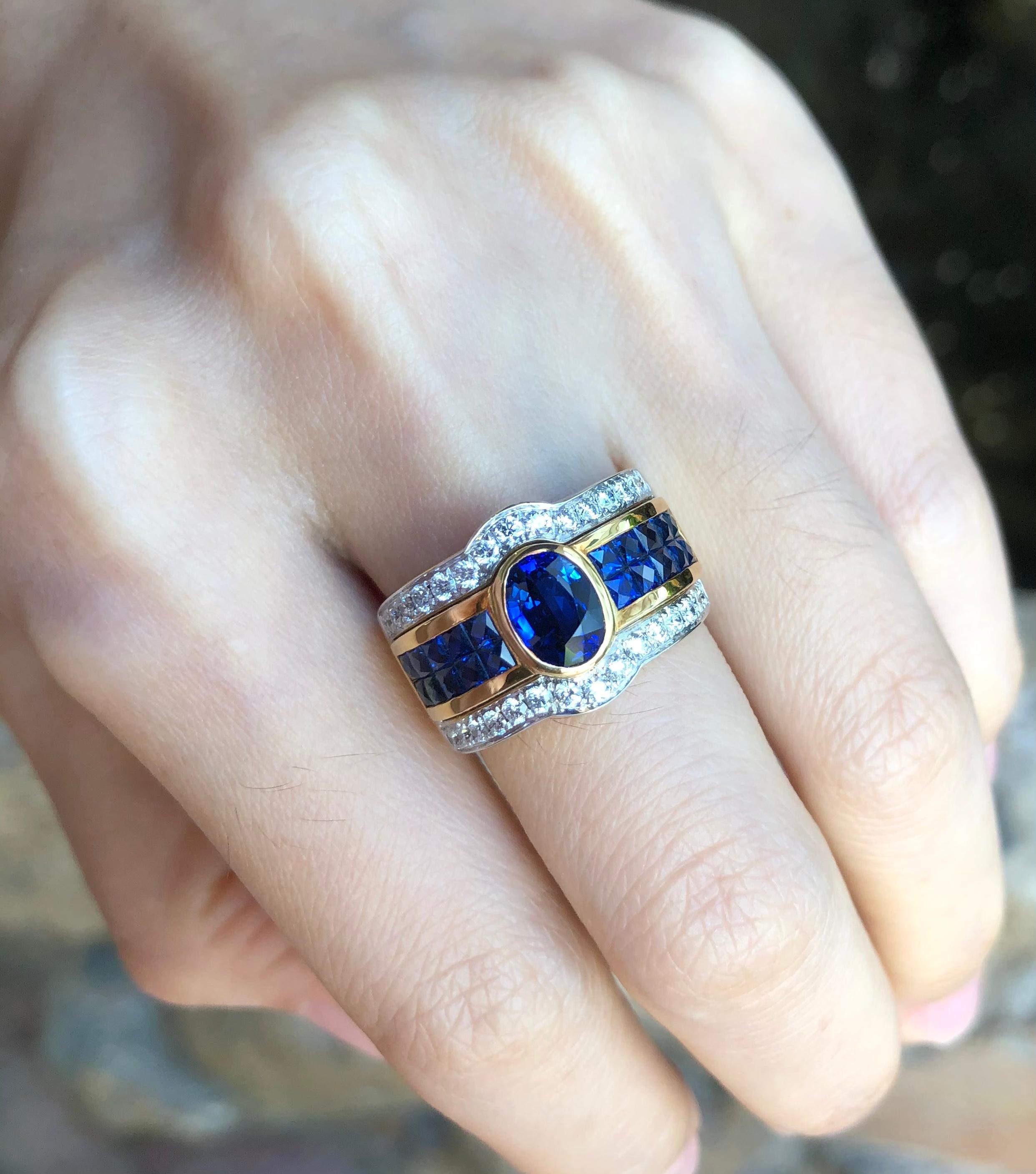 Blue Sapphire 1.36 carats with Diamond 0.58 carat and Blue Sapphire 1.98 carats Ring set in 18 Karat Gold Settings

Width:  2.0 cm 
Length:  1.3 cm
Ring Size: 52
Total Weight: 12.42 grams

