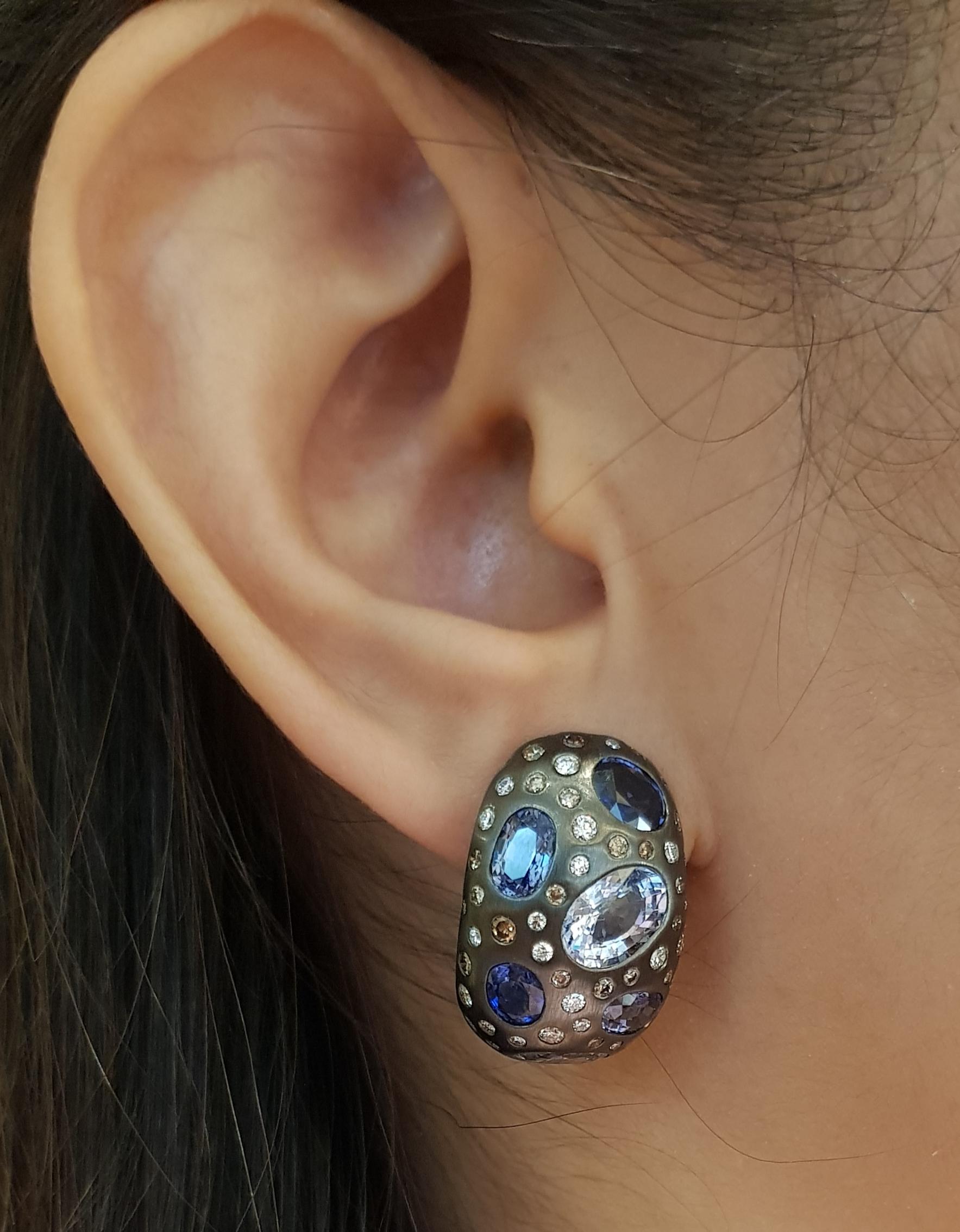 Blue Sapphire 10.80 carats with Diamond 0.82 carat and Brown Diamond 0.99 carat Earrings set in 18 Karat White Gold Settings

Width:  1.6 cm 
Length:  2.4 cm
Total Weight: 16.95 grams

