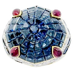 Blue Sapphire with Diamond and Cabochon Ruby Ring set in 18K Gold Setting