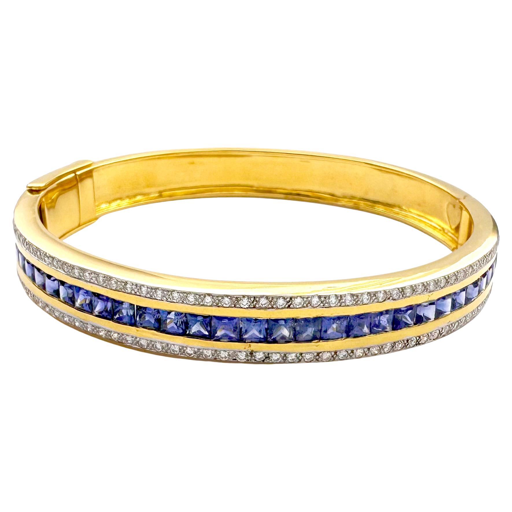 Bracelet en or 18K serti de saphirs bleus et de diamants