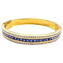 Blue Sapphire with Diamond Bangle set in 18K Gold Setting