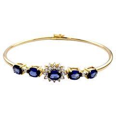 Blue Sapphire with Diamond Bangle set in 18K Gold Setting