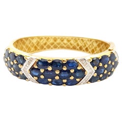 Blue Sapphire with Diamond Bangle set in 18K Gold Settings