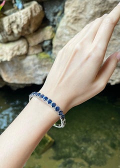Blue Sapphire with Diamond Bangle set in 18K White Gold Settings