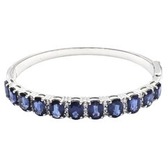 Blue Sapphire with Diamond Bangle set in 18K White Gold Settings
