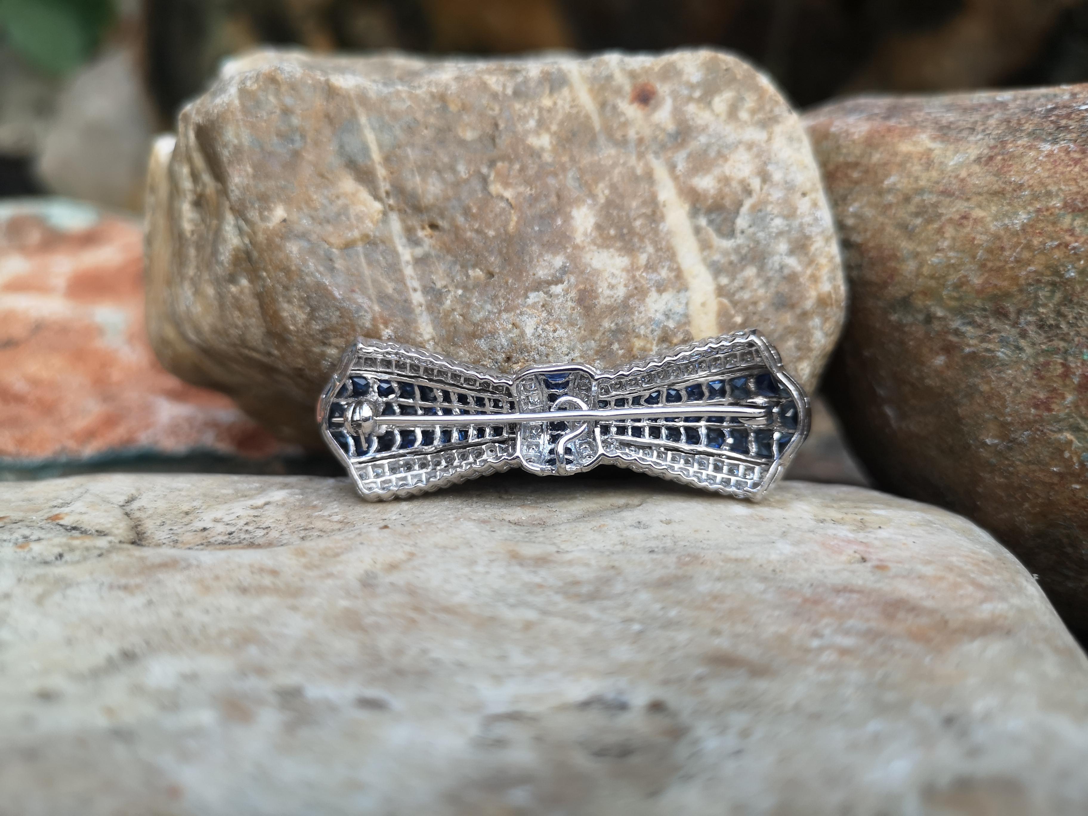 Art Deco Blue Sapphire with Diamond Bow Brooch Set in 18 Karat White Settings For Sale