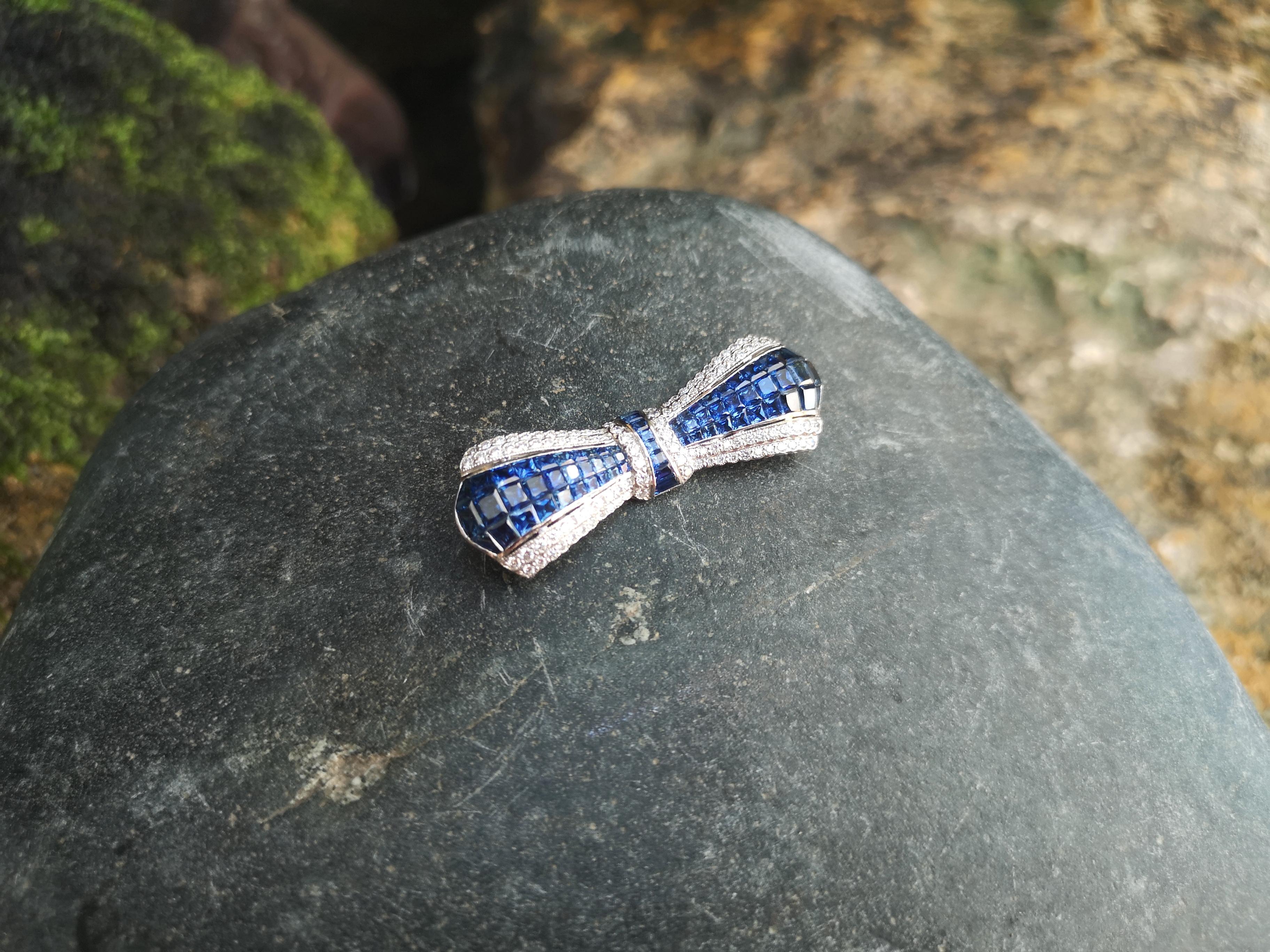 Women's or Men's Blue Sapphire with Diamond Bow Brooch Set in 18 Karat White Settings For Sale