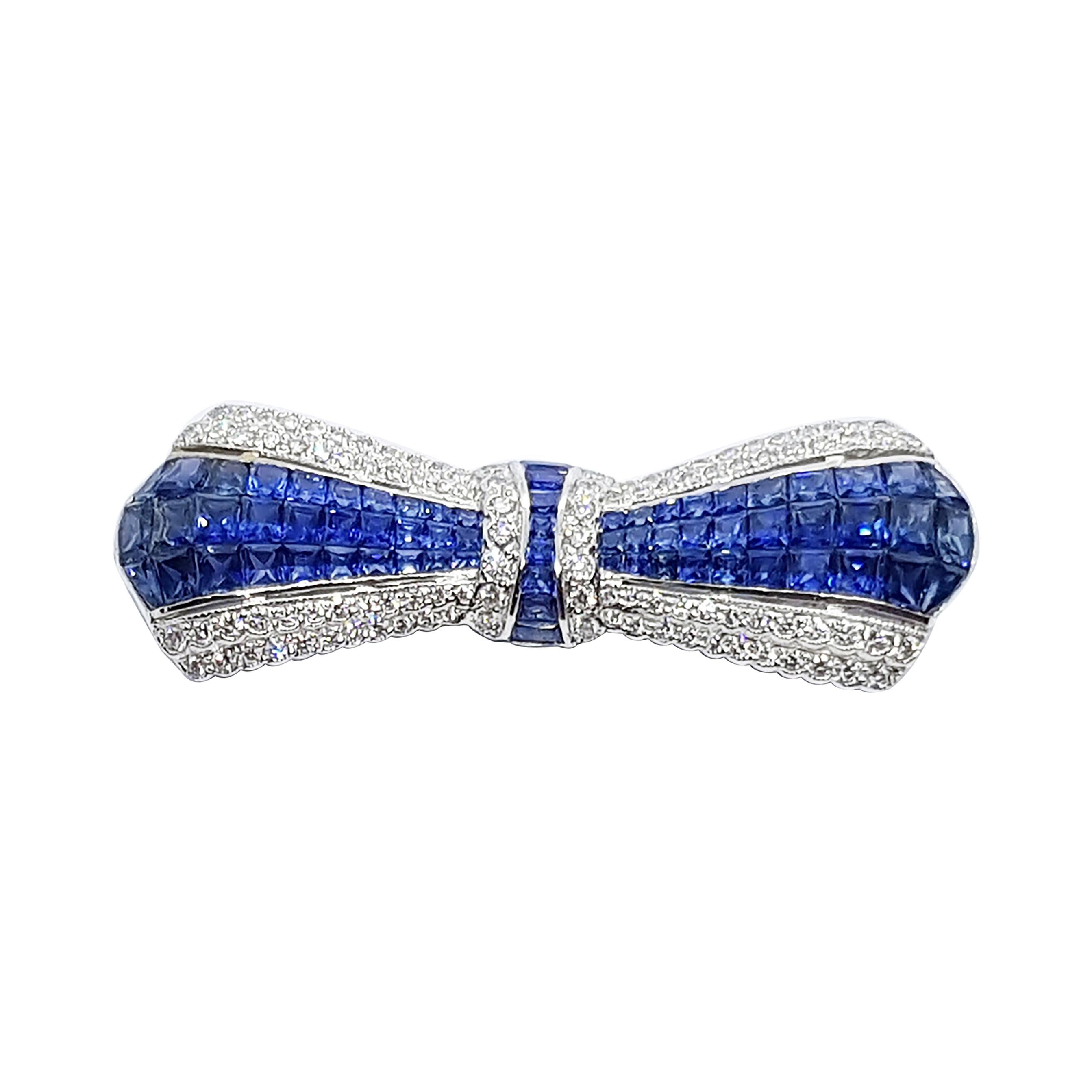 Blue Sapphire with Diamond Bow Brooch Set in 18 Karat White Settings For Sale