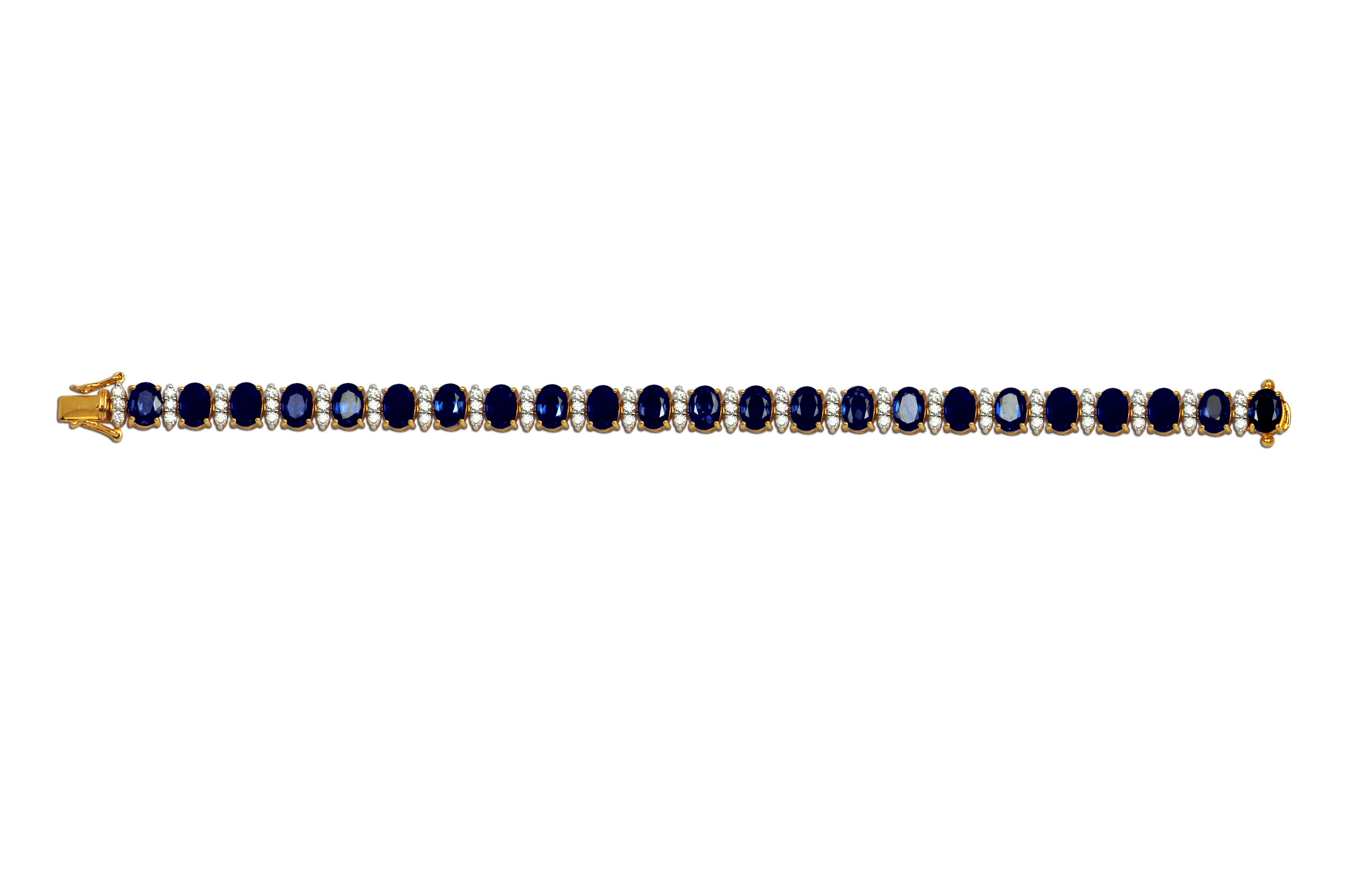 Blue Sapphire 22.59 carats with Diamond 1.08 carats Bracelet set in 18 Karat Gold Settings 

Width: 0.6 cm
Length: 18.5 cm 


