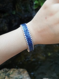 Bracelet en or 18 carats serti d'un saphir bleu et de diamants
